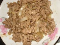 孜然葱头羊肉的做法
