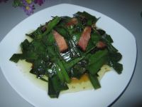 腊肉炒葱叶的做法